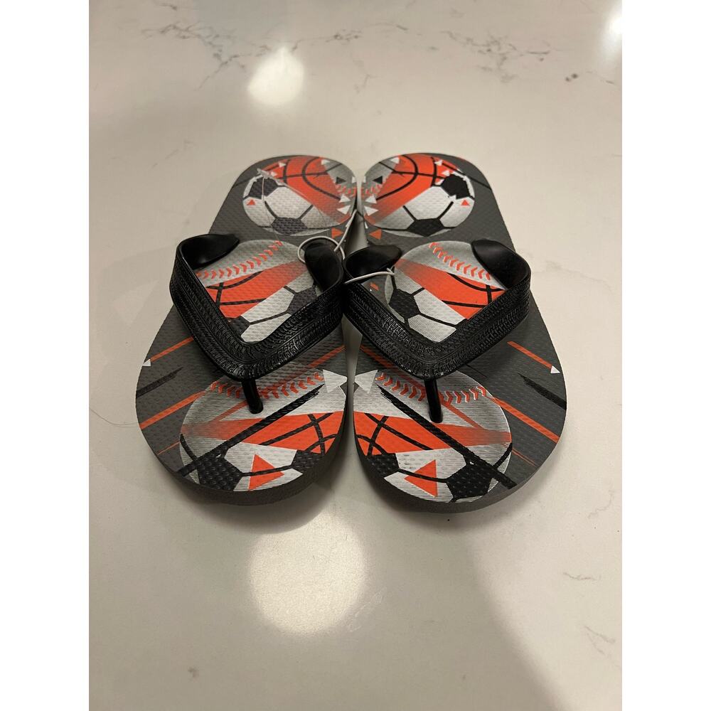 NWOT Boys Spots themed flip flops size 1/2